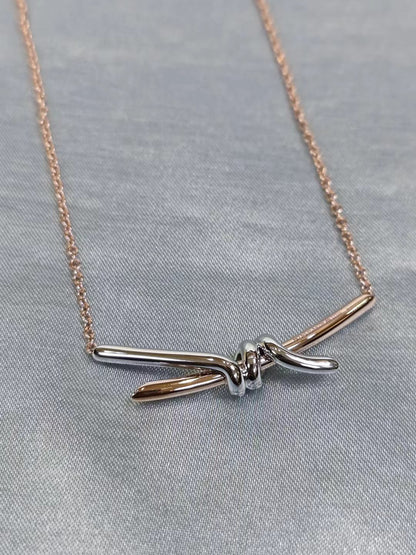 Tiffany Knot Pendant in Yellow Gold with Diamonds